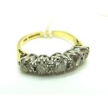 An 18ct Gold Five Stone Diamond Ring, claw set with graduated old cut stones (finger size L).