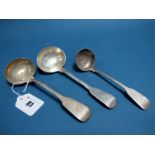 A Hallmarked Silver Sauce Ladle, WC, London 1825, initialled; Together with Another Example; and a