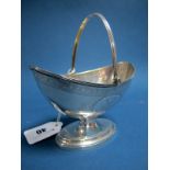 A Hallmarked Silver Swing Handled Sugar Basket, I.R, London 1793, with engraved band of decoration