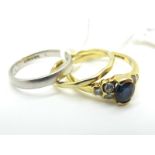 An 18ct Gold Sapphire and Diamond Ring, oval semi collet set to the centre (finger size O½); A