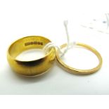 A 22ct Gold Wide Plain Wedding Band, (finger size J 1/2); Together with A Slim 22ct Gold Wedding