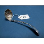 A Scottish Hallmarked Silver Sauce Ladle, CH, Edinburgh 1806, with twisted handle, initialled.