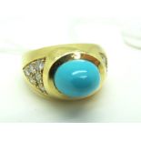 A Modern Turquoise and Diamond Set Dress Ring, high oval cabochon set to the centre, between pave