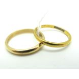 A 22ct Gold Plain Wedding Band, stamped inside "Fidelity", Birmingham 1913 (finger size M); A Modern