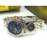 Breitling; A Bi-Metal Crosswind Automatic Gent's Wristwatch, the signed blue dial with three