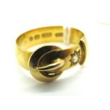 A 22ct Gold Buckle Style Ring, with diamond star set highlight (finger size R) (7grams).