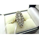 A Large Diamond Set Marquise Shape Cluster Ring, set throughout with graduated old cut stones,