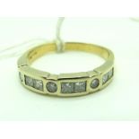 A Modern Diamond Set Half Eternity Band, rubover set with alternate brilliant and princess cut