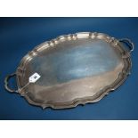 A Hallmarked Silver Twin Handled Tray, CB&S, Sheffield 1931, of shaped oval form between shaped loop