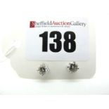 A Pair of 18ct Yellow and White Gold Single Stone Diamond Earstuds, (4mm and 4.5mm) brilliant cut