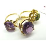 An Amethyst Single Stone Dress Ring, oval four claw set (finger size N); A Vintage Cluster Dress
