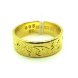 A 22ct Gold Patterned Band, of foliate design with a satin finish (finger size N) (6grams).