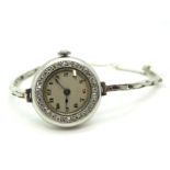 An Art Deco Diamond Set Ladies Cocktail Wristwatch, the circular dial with Arabic numerals, within