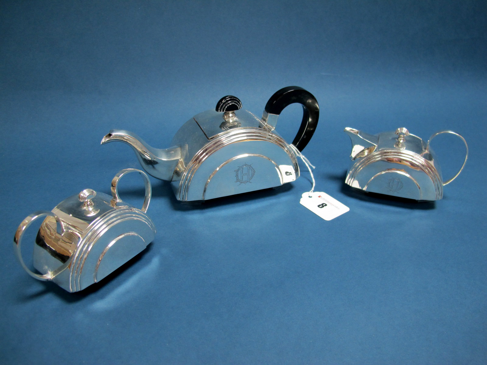 A Highly Stylish Art Deco Style Bachelor's Three Piece Tea Set, each of semi circular reeded design,