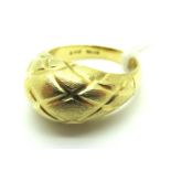 A Vintage Cocktail Dress Ring, tapering bombé design, with crossover pattern on a satin finish,