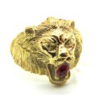 A Gent's Lion Head Dress Ring, with inset highlight, allover textured finish, stamped "750" (