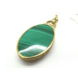 A Large Modern 9ct Gold Malachite and Lapis Lazuli Set Pendant, of oval form with Celtic band