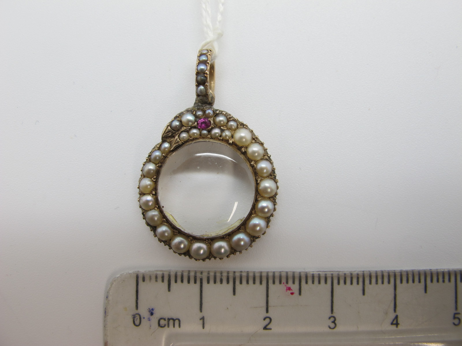 An Edwardian Pearl Set Locket Pendant, as a serpent, graduated set throughout, with central glazed - Image 2 of 5