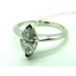 An 18ct White Gold Marquise Cut Single Stone Diamond Ring, point set between knife edge shoulders (
