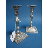 A Pair of Cast Hallmarked Silver Taper Candlesticks, C.J Vander, London 1966, each with gadrooned