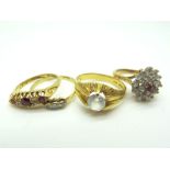 An 18ct Gold Diamond Set Ring, graduated claw set (finger size N); A Modern 9ct Gold Cluster Dress