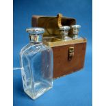 Asprey; A Matched Set of Three Hallmarked Silver Topped Plain Glass Bottles/Flasks, one stamped "