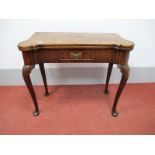 A Mid XVIII Century Red Walnut Tea Table, with fold-over top, single drawer, on cabriole legs and