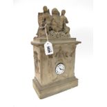 A Late XIX Century Mantel Clock, the carved stone rectangular case moulded in relief with figures