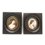 A Pair of Late XIX Century Oval Portrait Miniatures Painted on Ivory, of ladies, one with a white