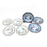 Four Chinese XVIII Century Octagonal Porcelain Plates, painted in the famille rose palette with