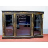 A XIX Century Ebonised Breakfront Credenza, with inlaid decoration, glazed doors, ormolu mounts,