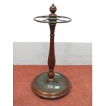A Mahogany Stick Stand, with turned finial, bronzed circular rail on turned stand and circular