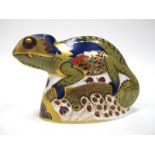 A Royal Crown Derby Paperweight 'Chameleon', gold stopper, date code for 2003, 13.5cm long.