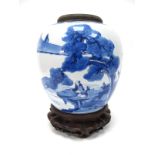 An XVIII Century Chinese Porcelain Ginger Jar, (lacking cover), of ovoid form, painted in blue