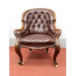 A XIX Century Mahogany Easy Chair, with hooped back and shaped arms, upholstered in button back