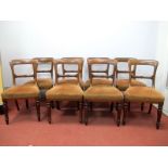 A Set of Eight William IV Mahogany Dining Chairs, with central rail, upholstered seats on turned and