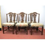 A Set of Six Mahogany Hepplewhite Revival Dining Chairs, the shield backs with pierced splat,