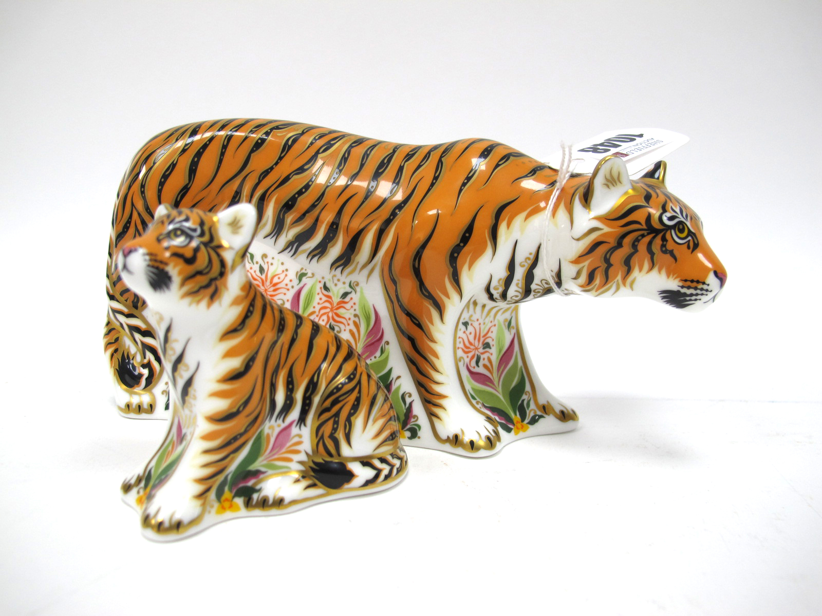 A Royal Crown Derby Paperweight 'Sumatran Tigress', gold stopper, date code for 2009, 19cm high;