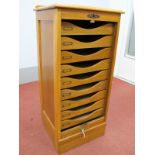 An Early XX Century Oak Filing Cabinet, with low back, tambour front concealing nine internal