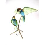 A Swarovski Crystal Paradise Bird Sculpture 'Bee Eaters', on metal branch, 29cm high.