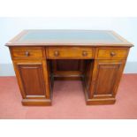 A Late XIX Century Mahogany Pedestal Desk, with crossbanded top and leather scriver, three