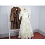 A c.1960's "Annelle" Cream Lace Wedding Dress, with roll collar, full length sleeves and full