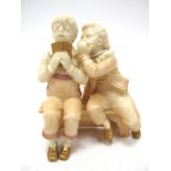 A Royal Worcester Porcelain Figure Group, in the Kate Greenaway style, with blush ivory glaze,