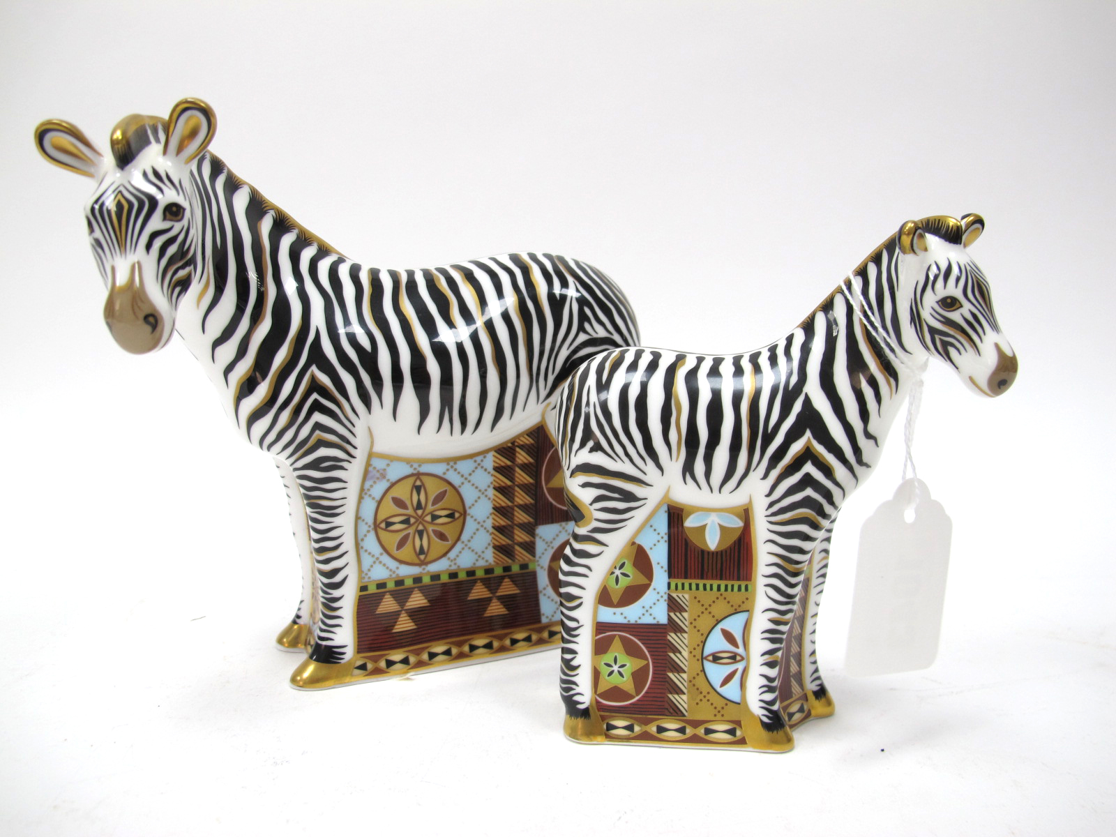 A Royal Crown Derby 'Zebra' Paperweight, gold stopper, date code for 2007, 17cm high; Another, 'Baby