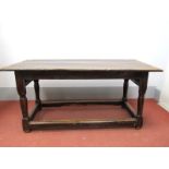A XVII Century Joined Oak Refectory Table, with rectangular plank top, baton ends, the base with