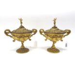A Pair of XIX Century Gilt Metal Two Handled Bowls and Covers, with cherub finials moulded in relief
