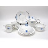 A Shelley Porcelain 1930's Art Deco Part Tea Service, decorated with stylised flowers within