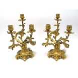 A Pair of Mid XX Century French Ormolu Three Branch Candelabra, with foliate scroll branches, raised