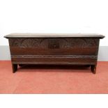 A XVII Century Joined Oak Rapier Chest, the top with bail hinges, moulded edge, base with with