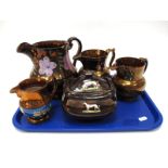 A Collection of Mid XIX Century Copper Lustre Ware, including sucrier and cover applied with